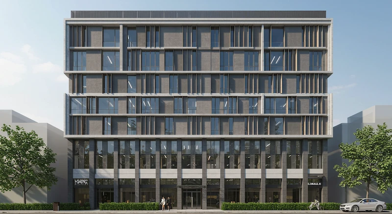 Vista frontal de prédio moderno com design contemporâneo que integra vidro, sombreamento e texturas, destacando estética e funcionalidade.